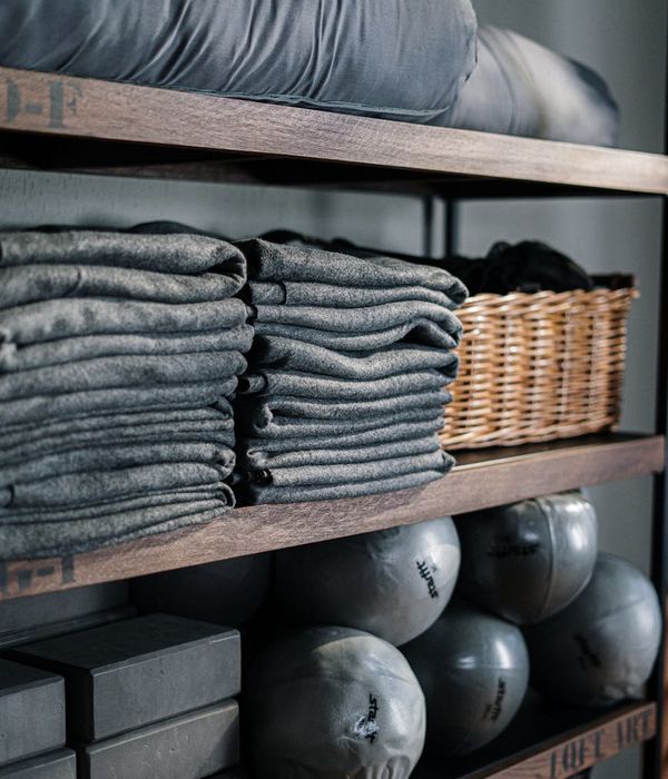 Minimalist yoga space with ice blue accents
